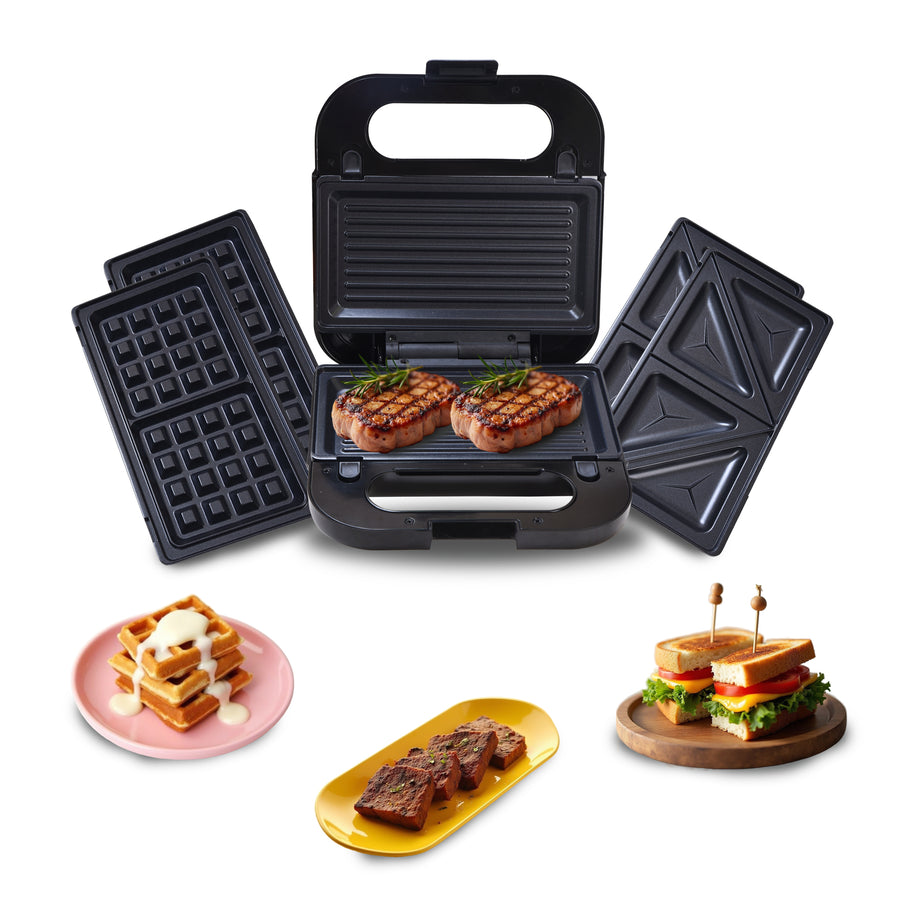 Multifunctional grill with waffle, sandwich, and steak making attachments on a white background.